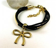 Pozłacana kokardka i czerń