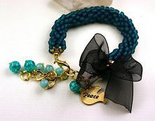 Koralikowy wąż  tukus złoto...