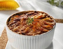 Zapiekane ziemniaki w sosie maślano-serowym