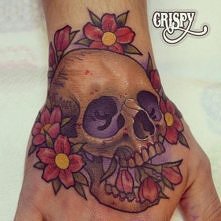 skull hand tattoo