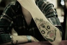 skull forearm tattoo
