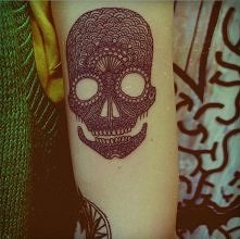 skull forearm tattoo