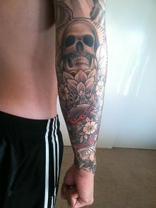 skull forearm tattoo
