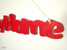 napis wycięty z płyty