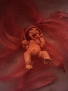 Bobas z koralową czapeczką