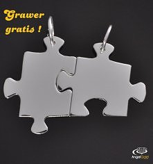 Dwa puzzle, na każdym GRAWE...