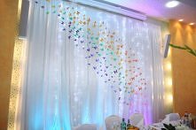 kompozycja z tęczowych motylków