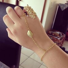 Złoty pierścionek połączony z bransoletką