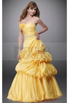 The chest with slight dipped neckline is asymmetrically pleated and decorated with rose-like ornaments, highlighting your dainty round bust. Shining beaded band circles the wais...