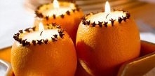 na stół można dodać własnoręcznie zrobione świeczniki z pomarańczy