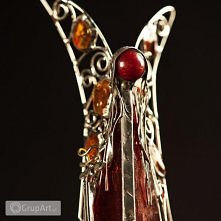 Lampion witrażowy Tiffany z bursztynem - cudowna światłość z niego bije:)
Te i inne cudowności do kupienia w grupart.pl
Polecam. Tu nie ma rzeczy przeciętnych :)