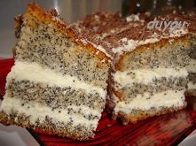 Ciasto makowe z kremem z białej czekolady
Poncz do nasączenia ciasta:
1/2 szkl. wody
3 łyżki rumu

Ciasto:
5 jajek
15 dkg cukru pudru
2 łyżki mielonych migdałów
12 dkg mąki psze...