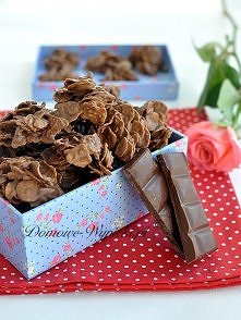 Pralinki z płatków kukurydzianych
Składniki:
50g płatków kukurydzianych
50g płatków migdałowych
200g czekolady mlecznej
Sposób przygotowania:
Czekoladę połamać na kawałki i rozt...