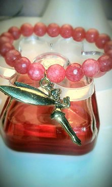 Dzwoneczek.
Kamień jadeit fasetowany.