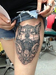 wolf thigh tattoo