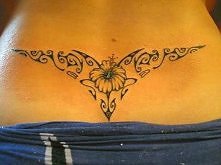 beauty lower back tattoo