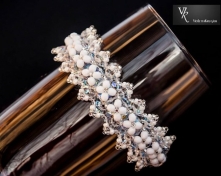 no. 18
Koralikami haftowana...