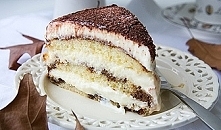 Spód:
•	100 g masła
•	2 jajka
•	170 g cukru
•	180 g mąki
•	2 łyżeczki proszku do pieczenia
•	100 ml mleka

Krem:
•	4 żółtka
•	170 g drobnego cukru do wypieków
•	500 g sera masca...