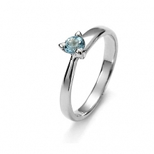 Delikatne piękno pierścionka z białego złota z topazem