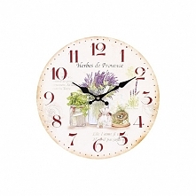Okrągły zegar z jasnym tłem, a na nim typowo prowansalski motyw bukiecików lawendy w różnych naczyniach. Posiada także duże cyfry w oryginalnym czerwonym kolorze.