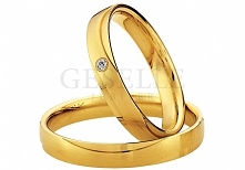 Delikatne obrączki ślubne w klasycznym stylu z kolekcji Saint Maurice z żółtego złota próby 333 z lśniącym oczkiem - GRAWER W PREZENCIE - kolekcja ślubna GESELLE Jubiler