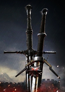 Dwa nagie miecze :) i medalion