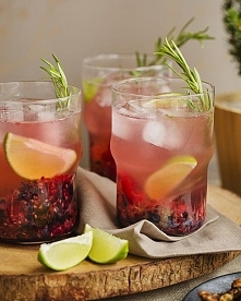 Norwegian Forest Cocktail

makes 2 cocktails

6 raspberries
10 blueberries
4 blackberries
2 sprigs of rosemary
4 lime wedges
ice
juice of 1/2 lime
1/2 cup simple syrup
1/2 cup v...
