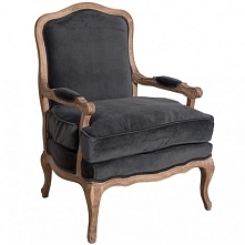 Dębowy solidny fotel Belldeco z czarnym obiciem i finezyjnymi nóżkami.