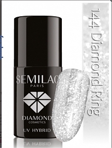 Charakterystyka: Kolor biżuteryjny. Melanż diamentowej drobinki i srebrnej, perłowej masy.  Krycie koloru – pełne.  Lakier hybrydowy SEMILAC® łączący w sobie właściwości żelu UV...