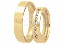 Nowoczesny komplet obrączek z żółtego złota z siecią lśniących cyrkonii na polerowanej powierzchni kruszcu - GRAWER W PREZENCIE - GESELLE Jubiler