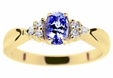 Elegancki, złoty pierścionek zaręczynowy z unikatowym tanzanitem i sześcioma brylantami o łącznej masie 0,09 ct - GRAWER W PREZENCIE - kolekcja GESELLE Jubiler