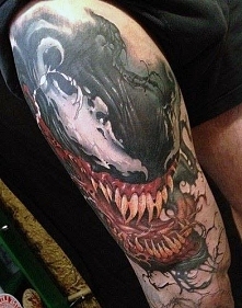 monster thigh tattoo