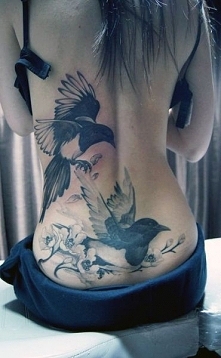 lower back tattoo bueaty birds