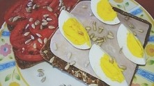 Pieczywo BIO z pomidorem oraz szynka i jajkiem oraz posypane słonecznikiem
