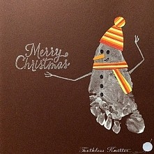 Kartka z odciskiem stópki.