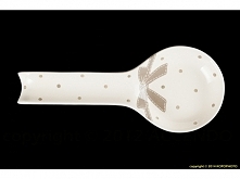 Porcelanowa podstawka pod łyżkę skutecznie chroni blaty kuchenne przed zabrudzeniem.