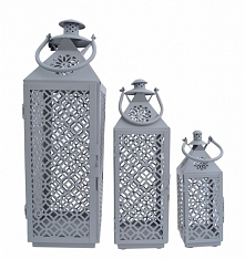 Komplet 3 metalowych latarni w kolorze szarym ażurowe z uchwytami. Latarnie o wysokości 60, 44 i 30 cm. Idealne do dekoracji i wystroju wnętrza w domu lub w ogrodzie. Cena dotyc...