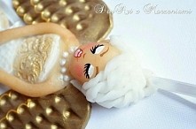 Aniołek z zimnej porcelany,...