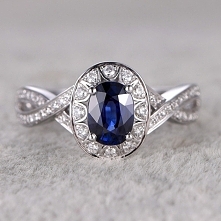 5X7MM OVAL CUT BLUE SAPPHIRE AND DIAMOND ENGAGEMENT RING 14K WHITE GOLD HALO TWIST LOOP INFINITY