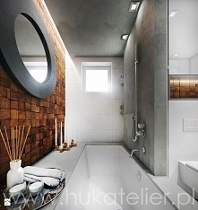 Łazienki kojarzą się z ceramicznymi płytkami, specjalną farbą, która "nie ciągnie" wilgoci i kamiennymi blatami. Drewno w łazience? Przecież ci spleśnieje, zawilgotnie...