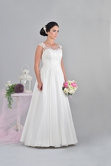 Klasyczna suknia ślubna o kroju litery "A".
virginia-suknie-slubne.pl