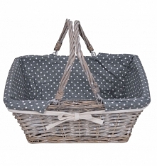 Koszyk ze składanymi rączkami - wiklinowy. Koszyk wyściełany materiałem granatowym w białe kropeczki. Koszyk wykonany z brązowo-szarej wikliny. Rączki koszyka mogą być na płasko.