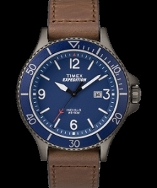 Timex TW4B10700 elegancki zegarek męski zasilany mechanizmem kwarcowym. Wykonany ze stali szlachetnej na skórzanym, brązowym pasku. Posiada niebieską tarczę z datownikiem miesię...