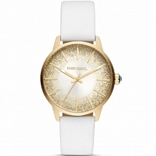 Diesel DZ5565 zegarek damski ze stalową kopertą w kolorze złota, której tarczę zdobi delikatny złoty brokat. Widnieje na białym pasku z silikonu. Aby przenieść się do sklepu kli...