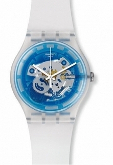 Swatch SUOK129 damski zegarek wykonany z białego tworzywa na pasku z przezroczystą tarczą pod którą widać niebieski mechanizm zegarka. Aby przenieść się do sklepu kliknij w zdję...