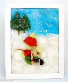 Dziewczynka lepiąca bałwana. Obraz z kolekcji Winter.