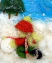 Dziewczynka lepiąca bałwana...