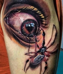 oko i pająk tatuaż
