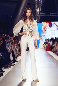 Gdzie szukać eleganckich sukien wieczorowych? Szereg propozycji znajdziesz w domu mody Sylwia Romaniuk. Alternatywą może być również kombinezon długi haftowany