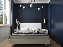 Nowoczesna niewielka sypialnia w niebieskiej kolorystyce.